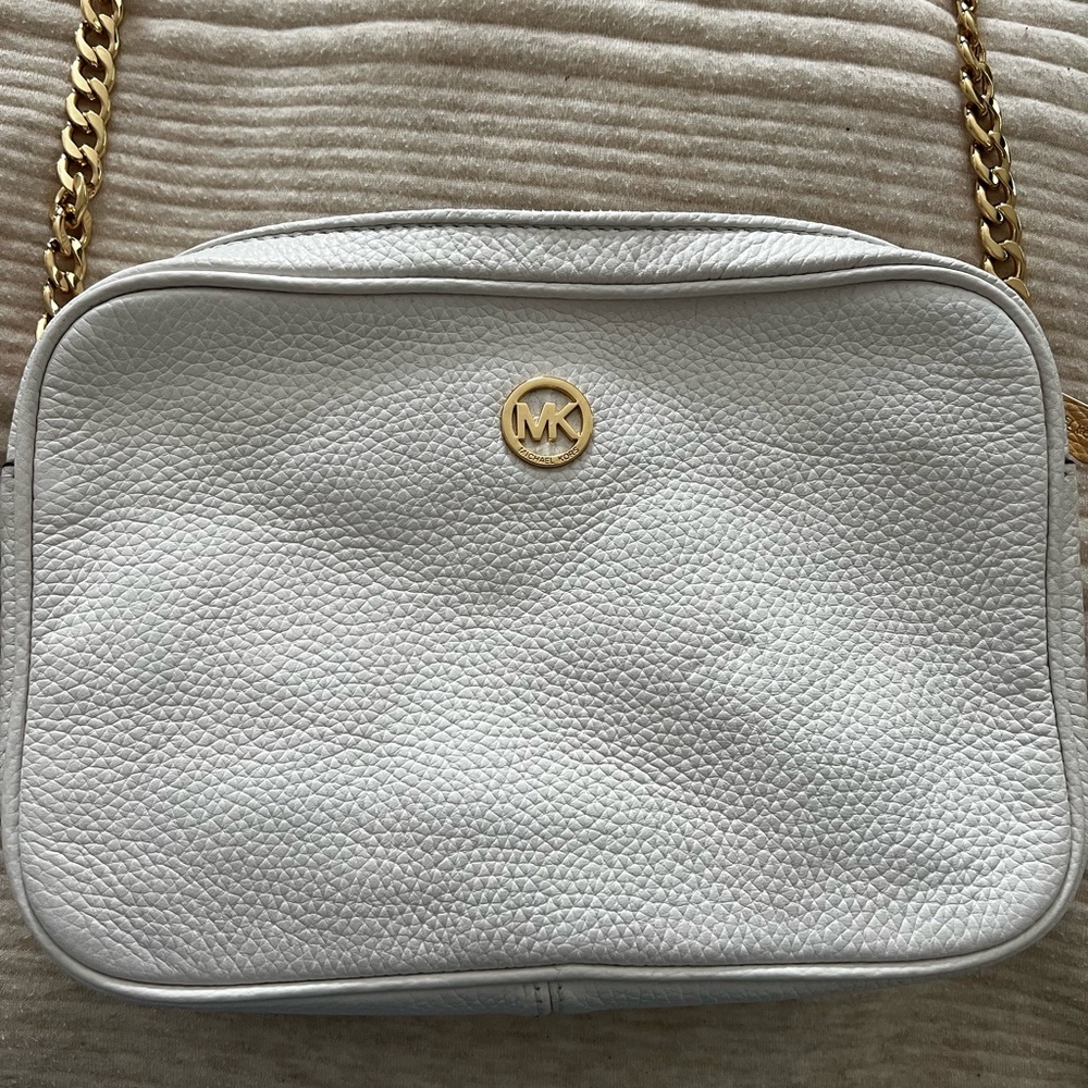 White leather Michael Kors crossbody with gold and leather chain strap